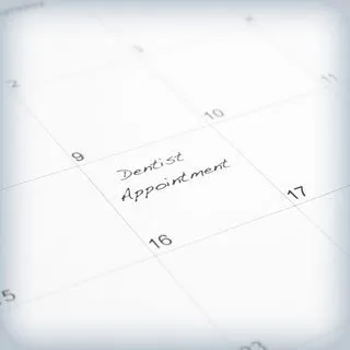 'Dentist Appointment' written on a calendar